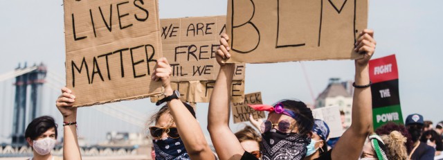 people-protesting-and-holding-signs-4614160.jpg